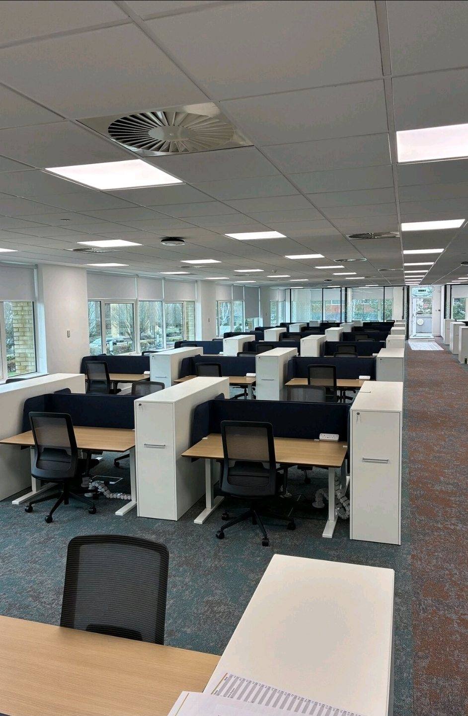 Desk rows with storage towers, completed