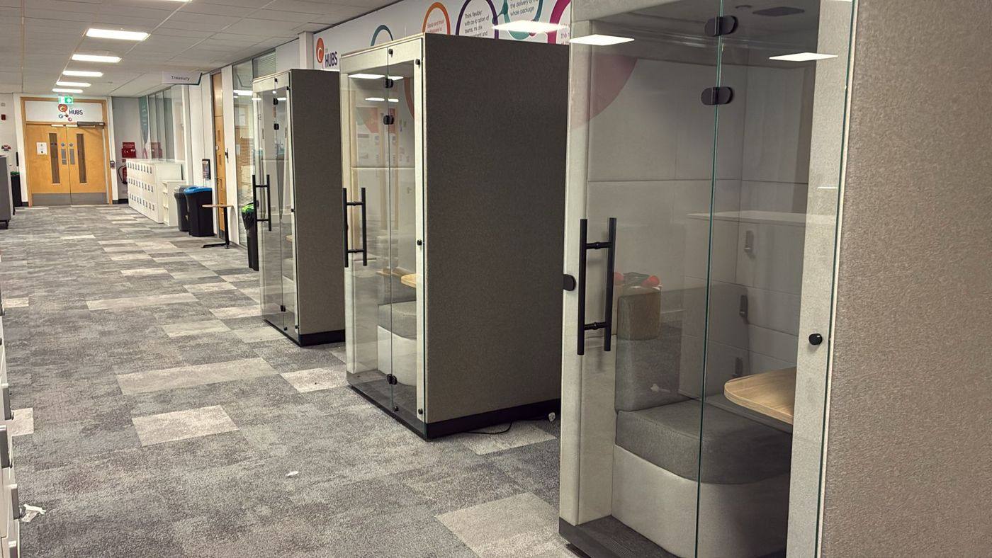 Phone booths, office corridor