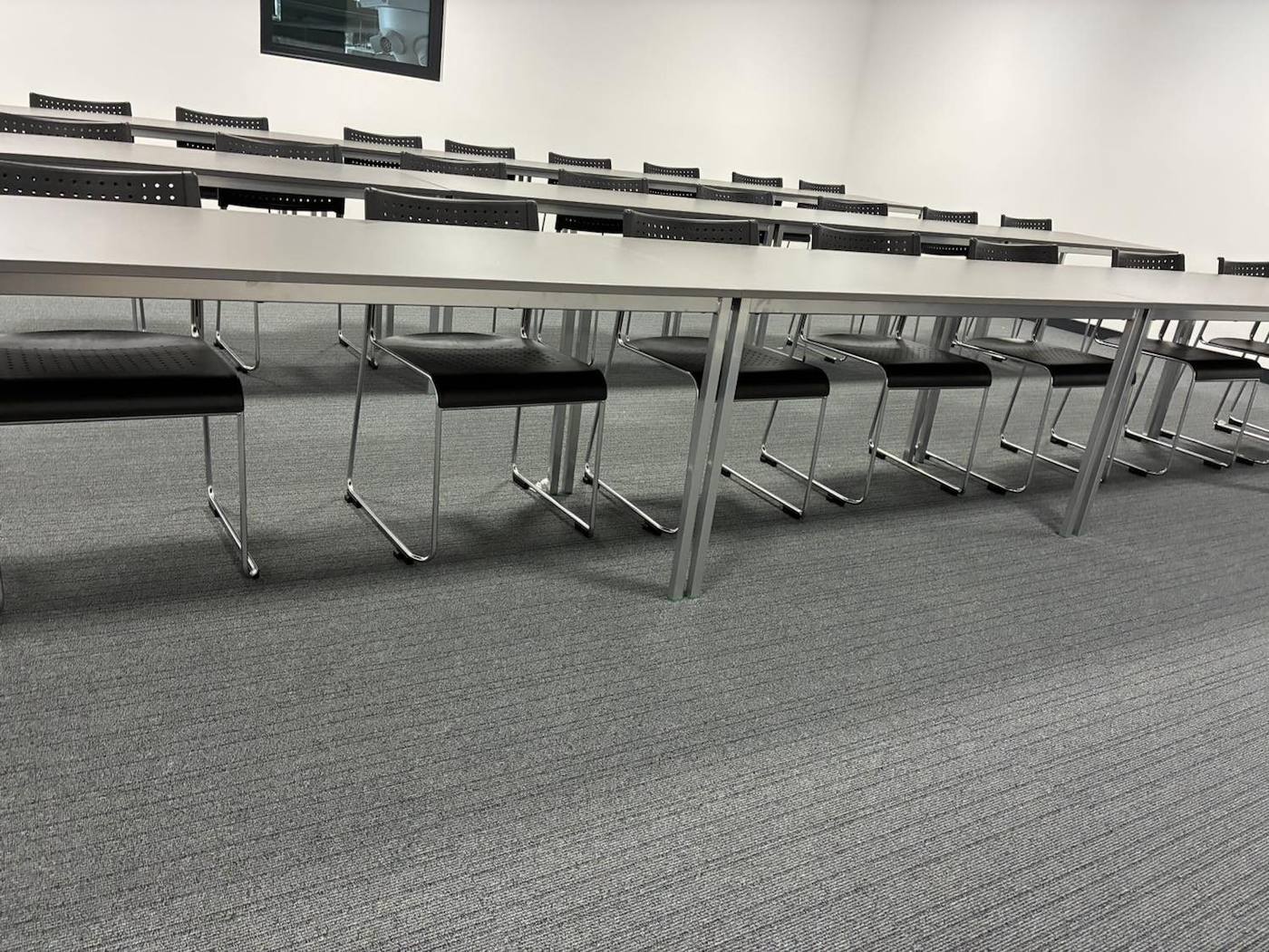 Tables and stacking chairs installed